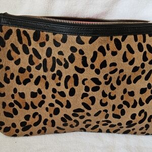 Furry leopard pouch